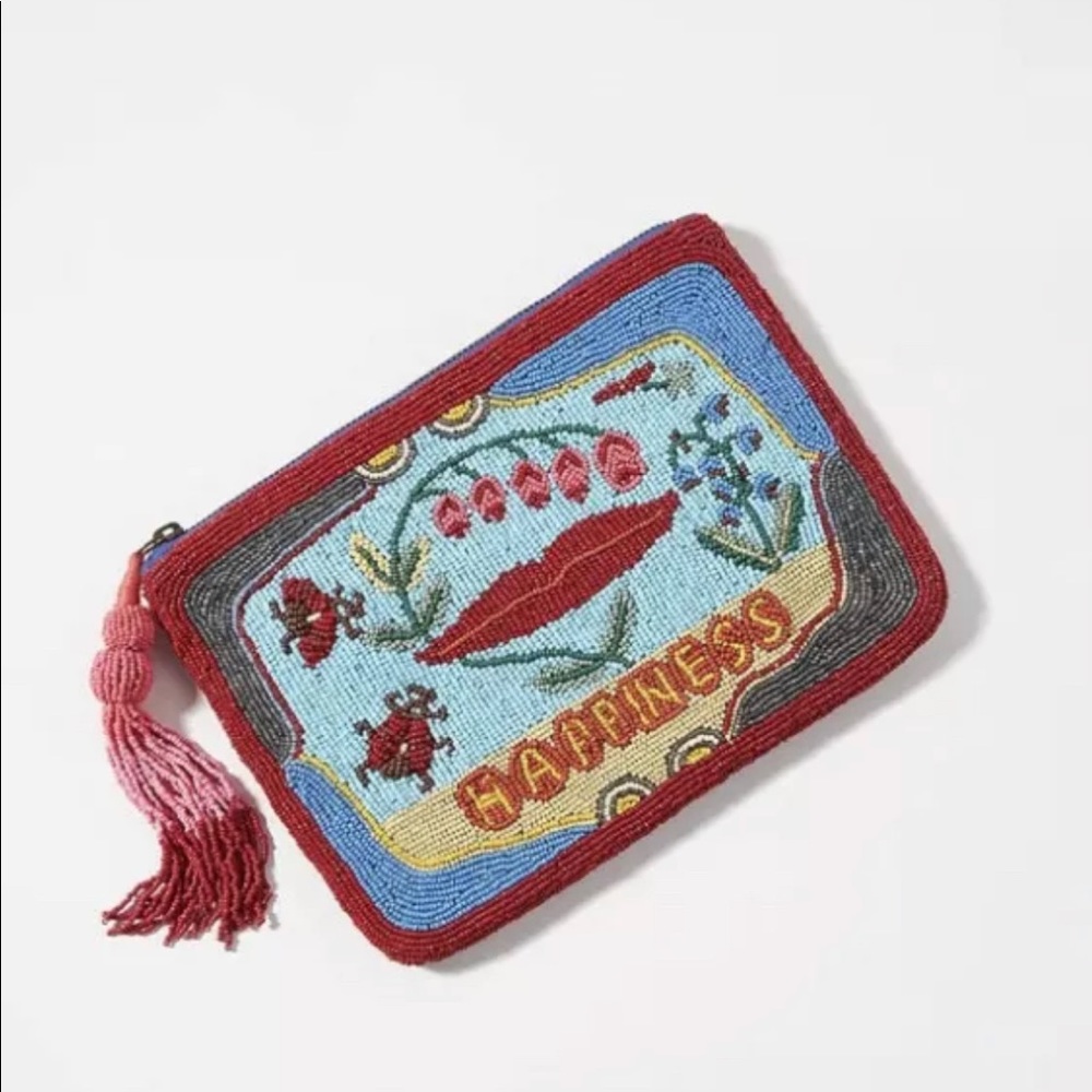 Anthropologie Nathalie Lete clutch “Happiness”. NWT, originally $98.